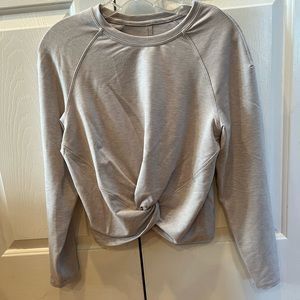 Lululemon sweatshirt with cute twist tie at the bottom